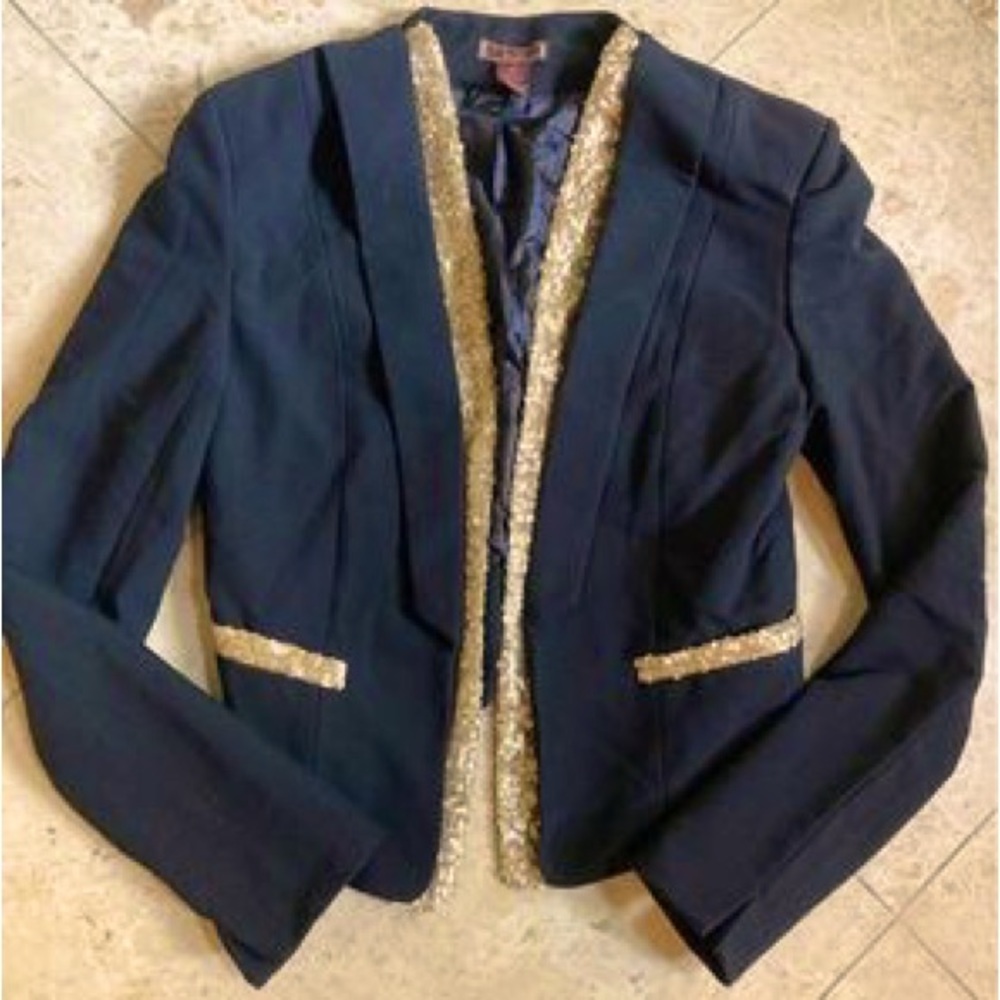 Black blazer with gold accents